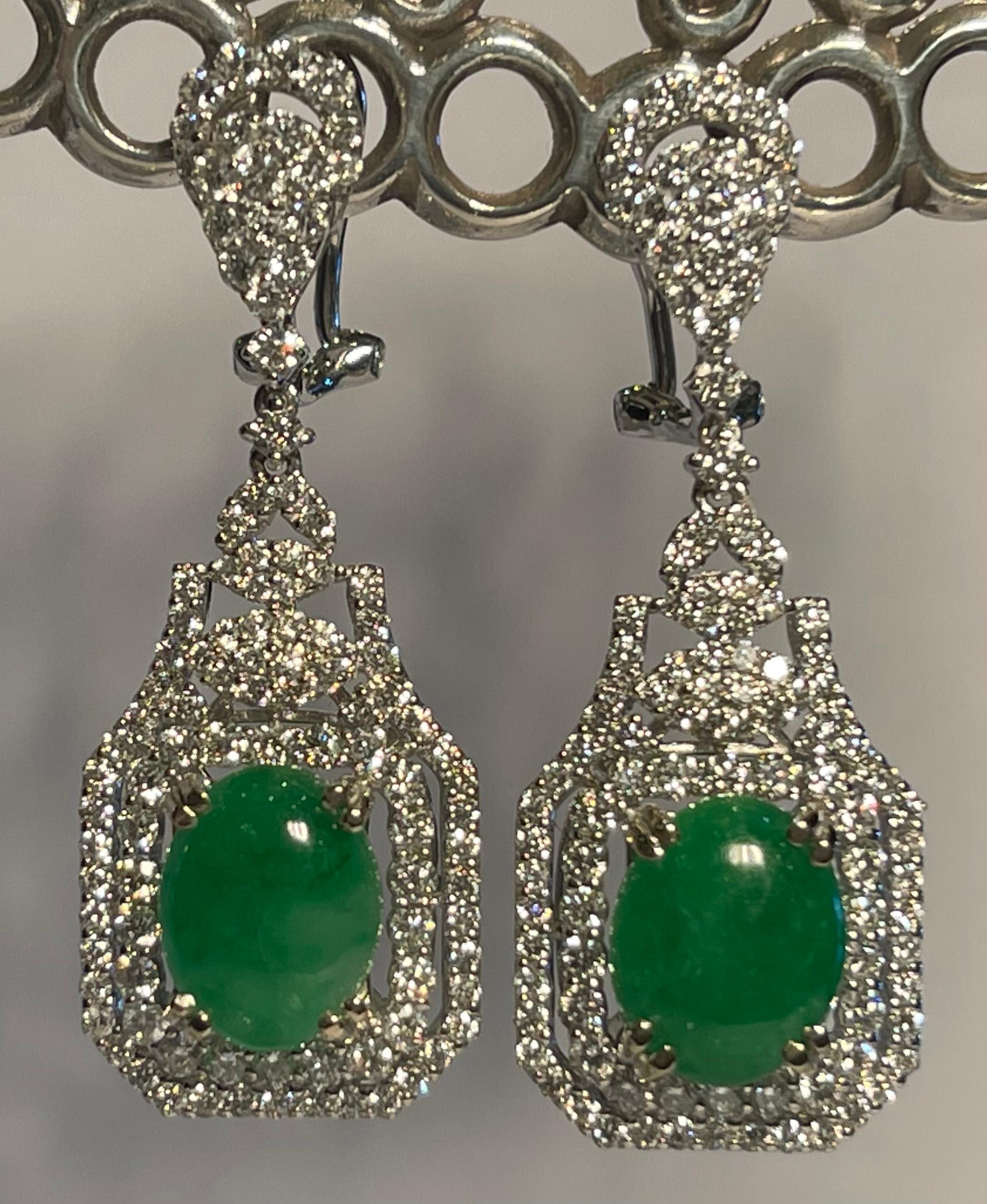 Very elegant, ladies 18 karat white gold estate jade and diamond Art Deco style drop earrings feature 212 round brilliant diamonds with the combined approximate total weight of 4.05 carats. Earrings are for pierced ears and have posts and omega