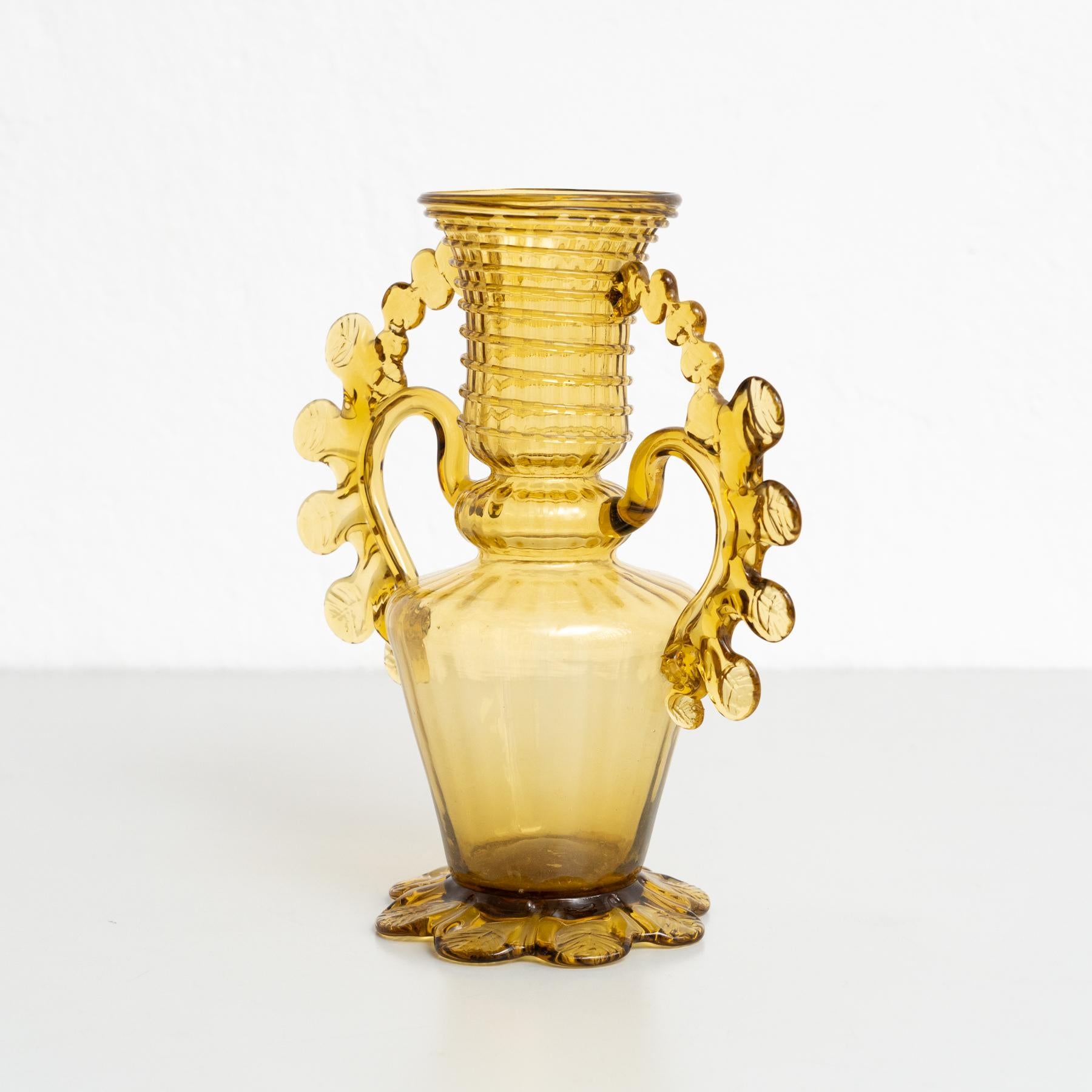 Enhance your decor with the timeless elegance of this vintage amber blown glass vase from the early 20th century. Crafted by an unknown Spanish manufacturer, this vase retains its original condition, bearing graceful minor wear that reflects its age