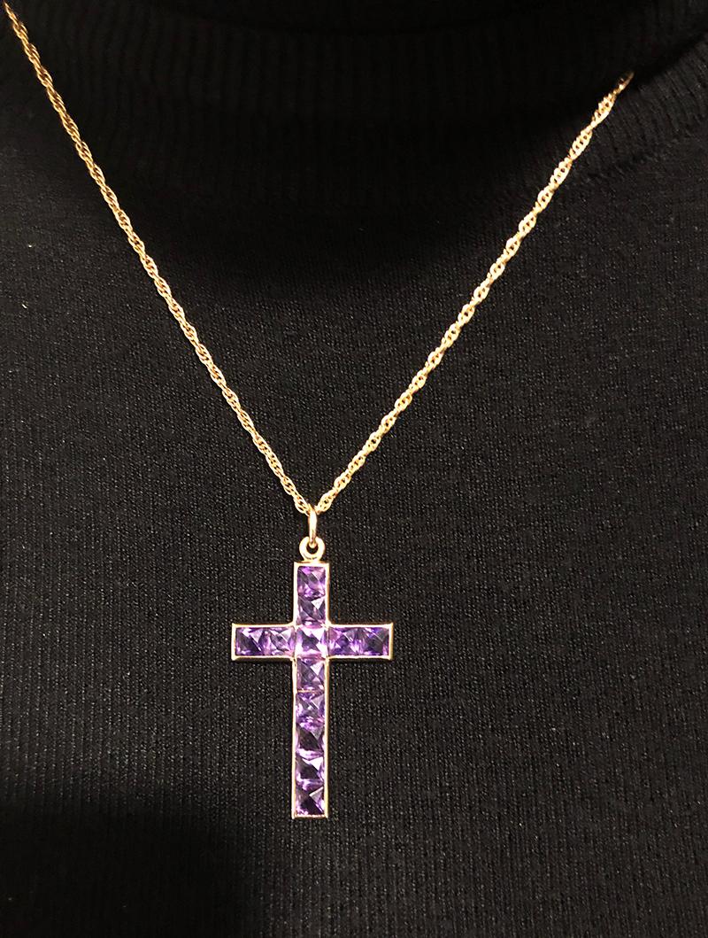 Most striking antique cross.  14K yellow gold, fully set with brilliant french-cut amethysts.  2/3