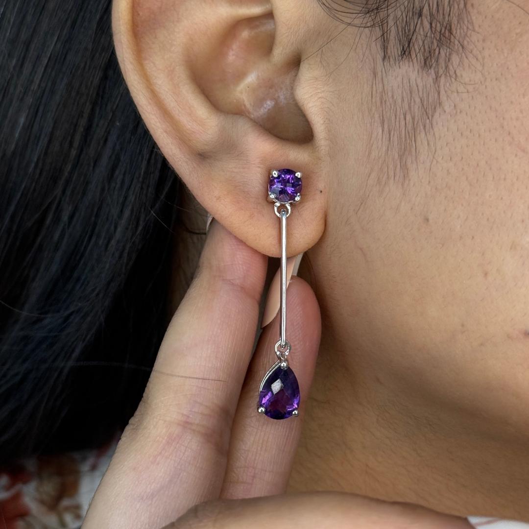 Elegant Amethyst Long Dangeling Drop Earrings in sterling silver to make a statement with your look. You shall need dangle drop earrings to make a statement with your look. These earrings create a sparkling, luxurious look featuring, pear, round cut