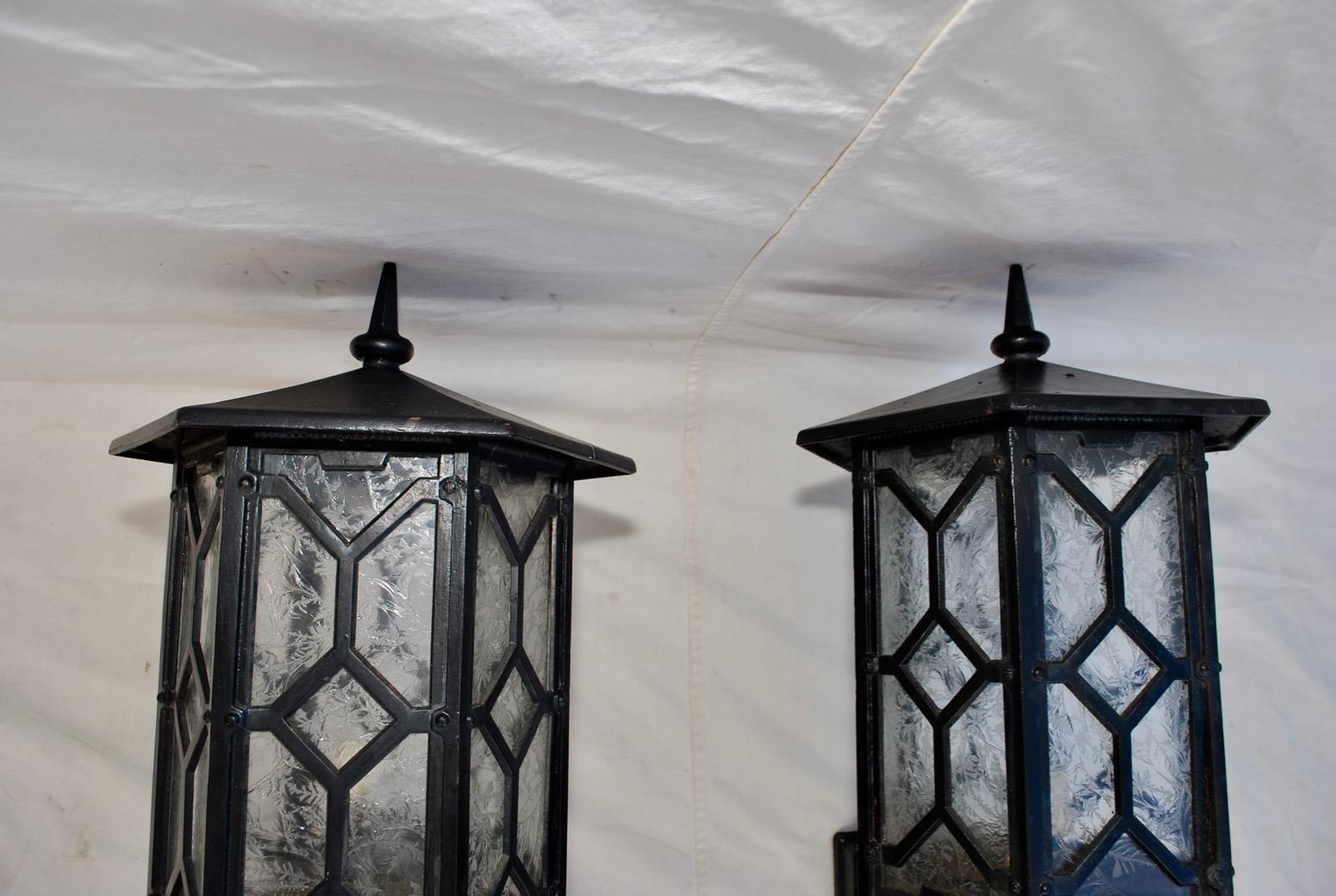 Elegant and Rare Large Pair of 1920s Cast Iron Outdoor Sconces In Good Condition In Los Angeles, CA
