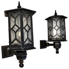 Elegant and Rare Large Pair of 1920s Cast Iron Outdoor Sconces