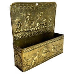 Elegant and useful Wall Shelf in brass in Empire style from the 19th Century