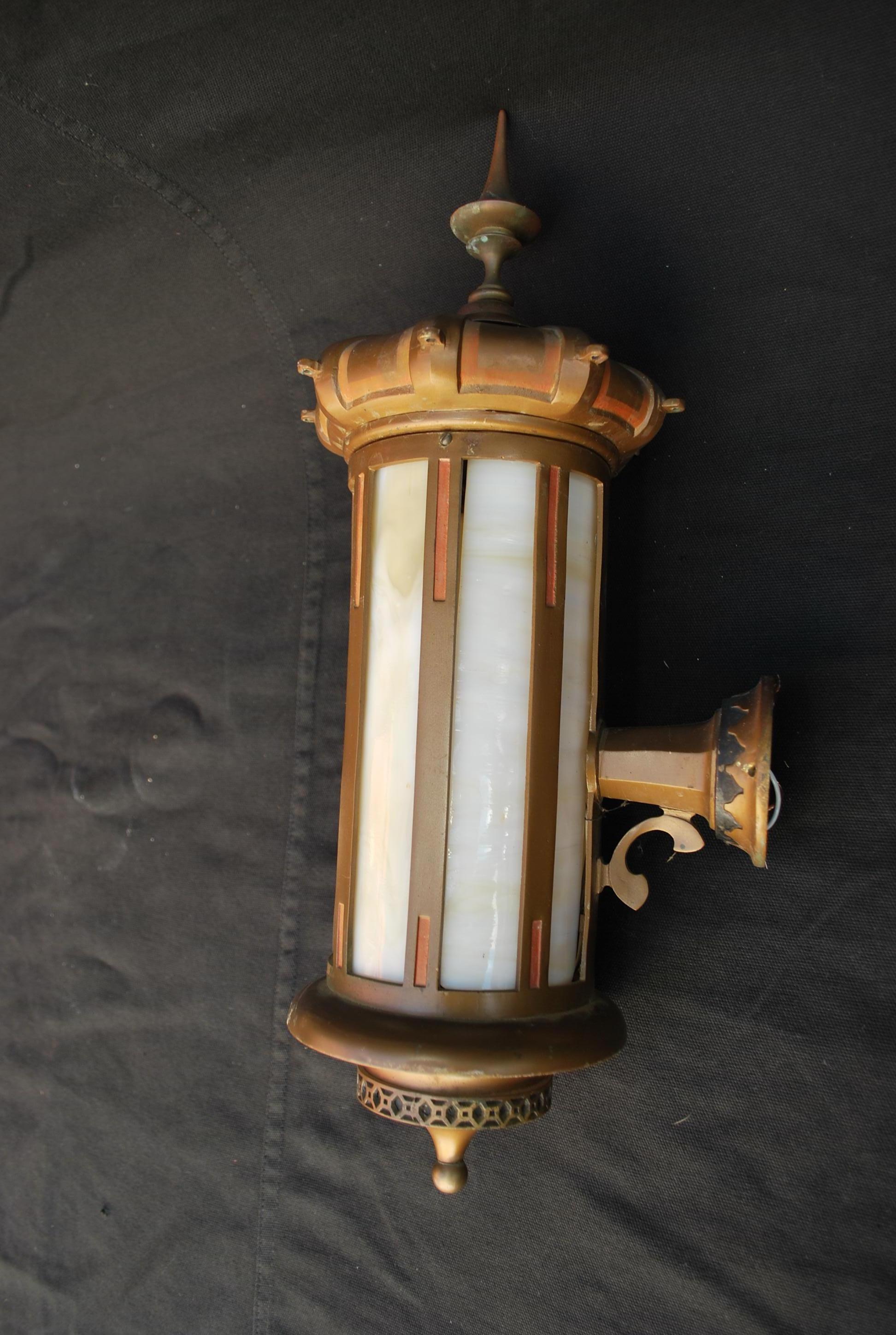 A beautiful and very rare pair of 1920's sconces, I think they came from a temple or masonic temple, I have been selling antiques sconces for 27 years, this is the first time I came across such rare sconces, beware they is a crack in the glass, (see