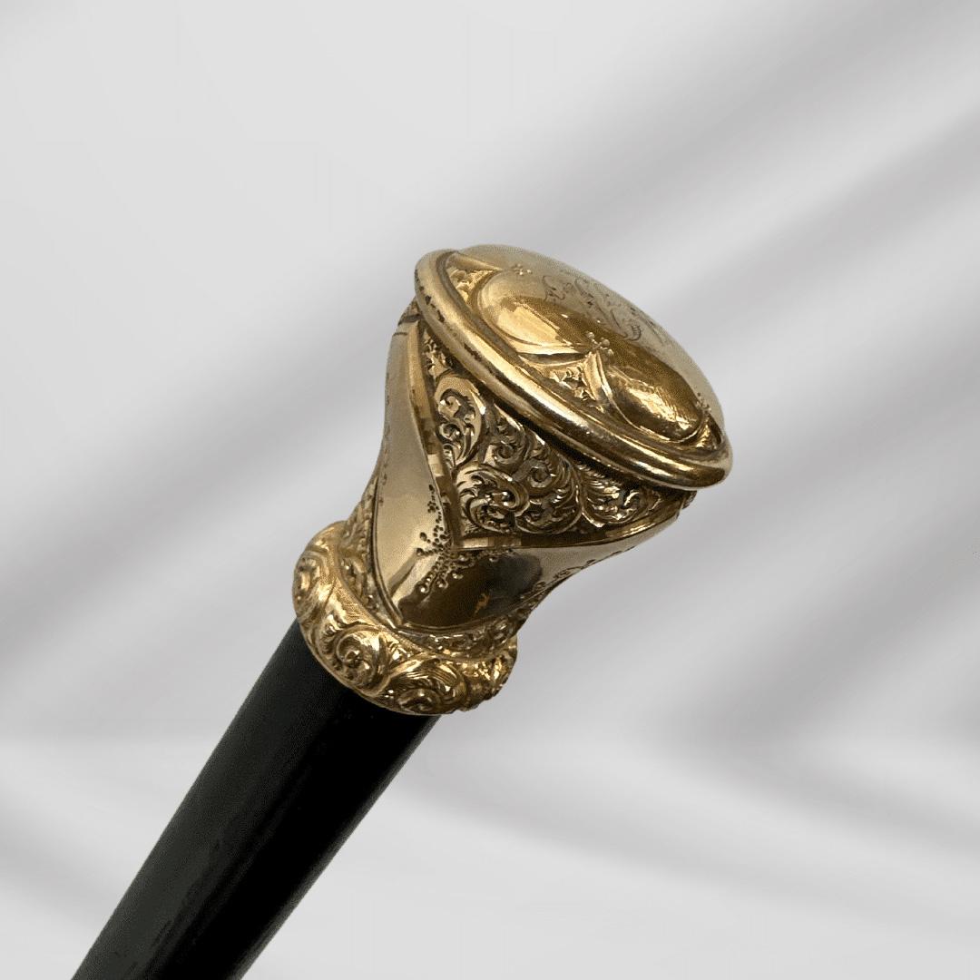Elegant Antique Carved Gold Plate Knob Handle Skinner Hallifax Walking Stick Cane Black

This timeless piece exemplifies classic elegance and seamlessly blends exquisite taste with functionality. The craftsmanship shines through just as much as does