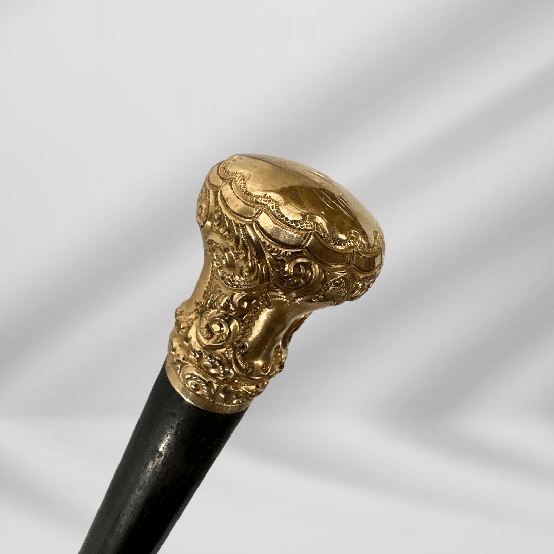 Elegant Antique Carved Gold Plate Knob Handle Unique Walking Stick Cane Black

This walking stick harkens back to an era of sophistication and elegance that is unmatched in modern life. It is an accessory that emanates style while providing a