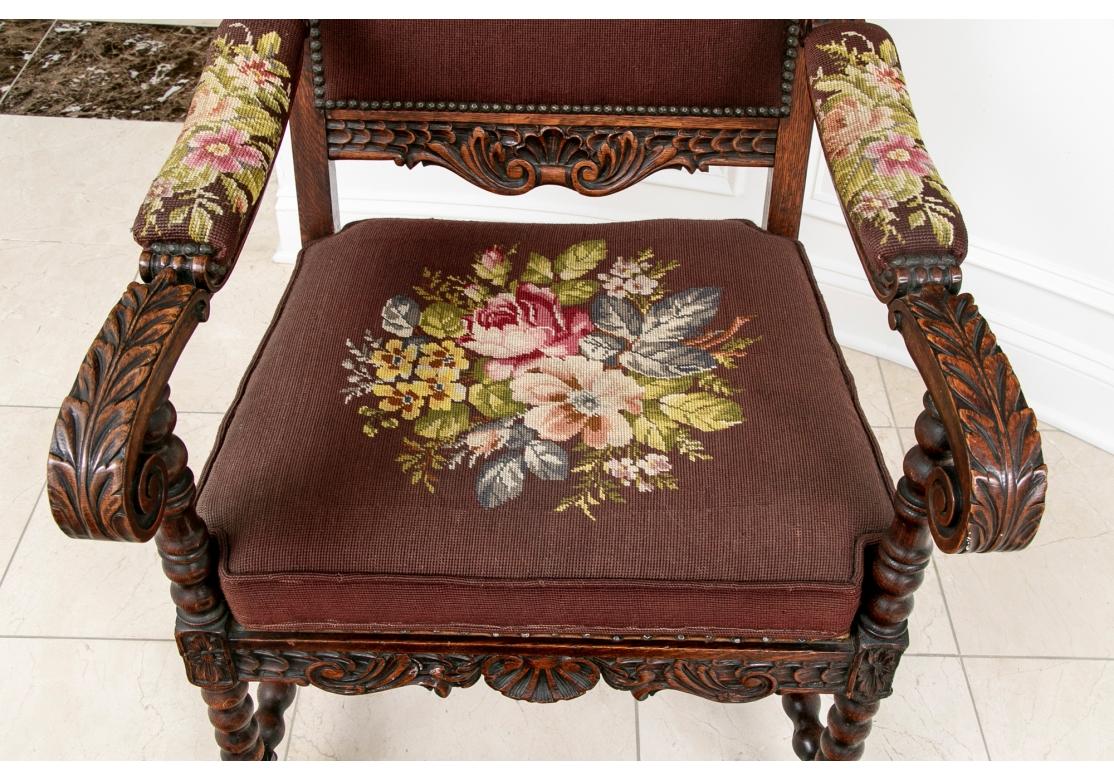 Tapisserie à l'aiguille Elegant Antique Carved Hall Wing Chair In Needlepoint Upholstery With Foot Stool (Fauteuil à oreilles sculpté avec tabouret de pied) en vente
