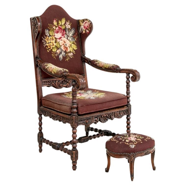 Elegant Antique Carved Hall Wing Chair In Needlepoint Upholstery With Foot Stool For Sale