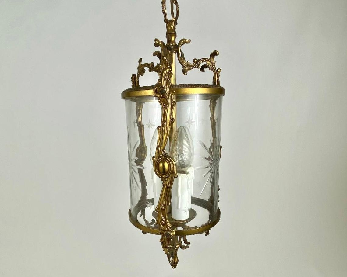 Antique brass lantern from the first half of the 20th century. France. 

Brass, faceted glass, decorative casting.

Lamp-lantern - a wonderful exclusive decoration that brings to your apartment only your mood and your unique emotions.

Antique
