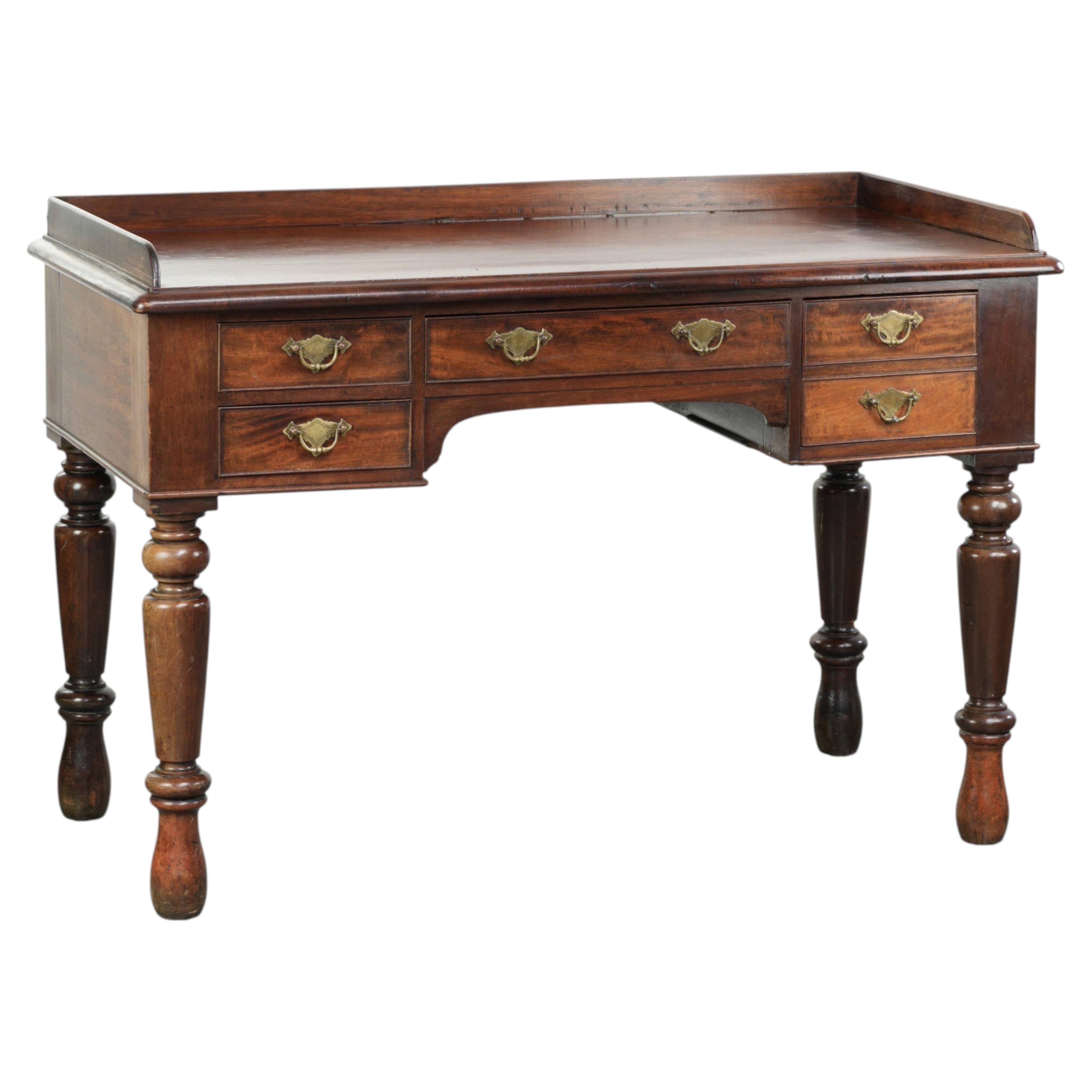 Elegant antique English desk / writing table from the mid-19th century