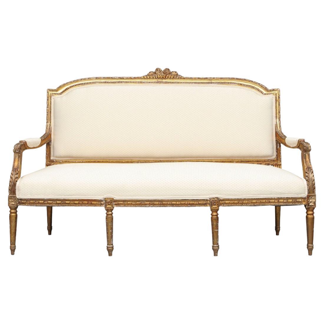 Elegant Antique French Carved and Gilt Settee in Louis XVI Style