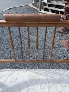 Elegant Antique French Curved Back Settee with Carved Spindlesa