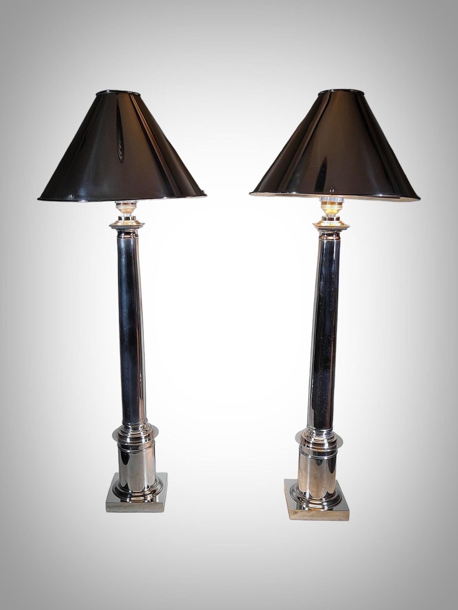 Introduce a touch of timeless sophistication with this magnificent pair of architectural design lamps crafted from solid nickel-plated bronze in the stylish spirit of 1970s Italy. A perfect blend of form and function, these lamps stand as a
