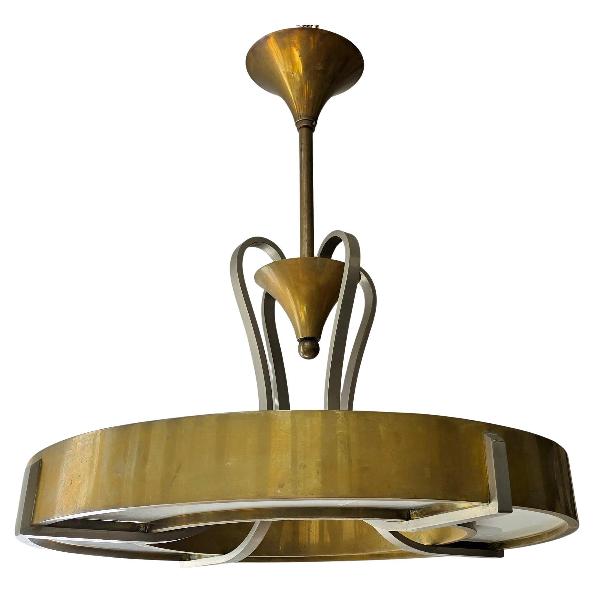 Elegant Art Deco and Bauhaus Brass and Opaline Glass Chandelier, France or Austria, circa 1930s

An exceptionally rare and architectural chandelier, crafted in the 1930s with clear influences of both Art Deco elegance and Bauhaus functional