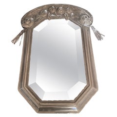 Elegant Art Déco wall mirror. Designed France 1920s.