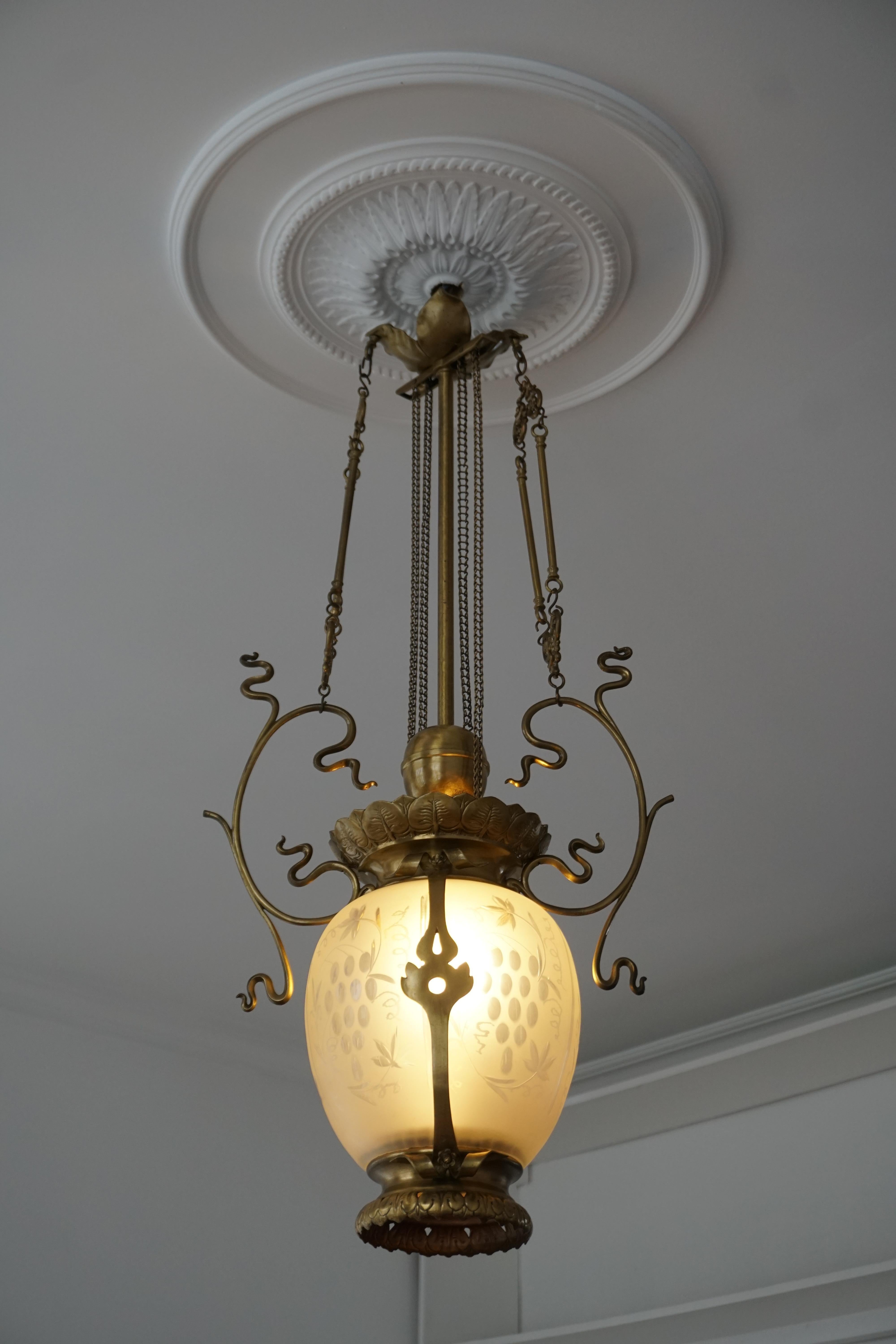 20th Century Elegant Art Nouveau Pendant Light in Brass and Glass For Sale