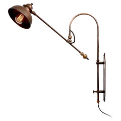 Elegant Articulating Bow Arm Wall Lamp