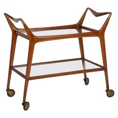 Elegant bar cart in walnut. Italy c1950