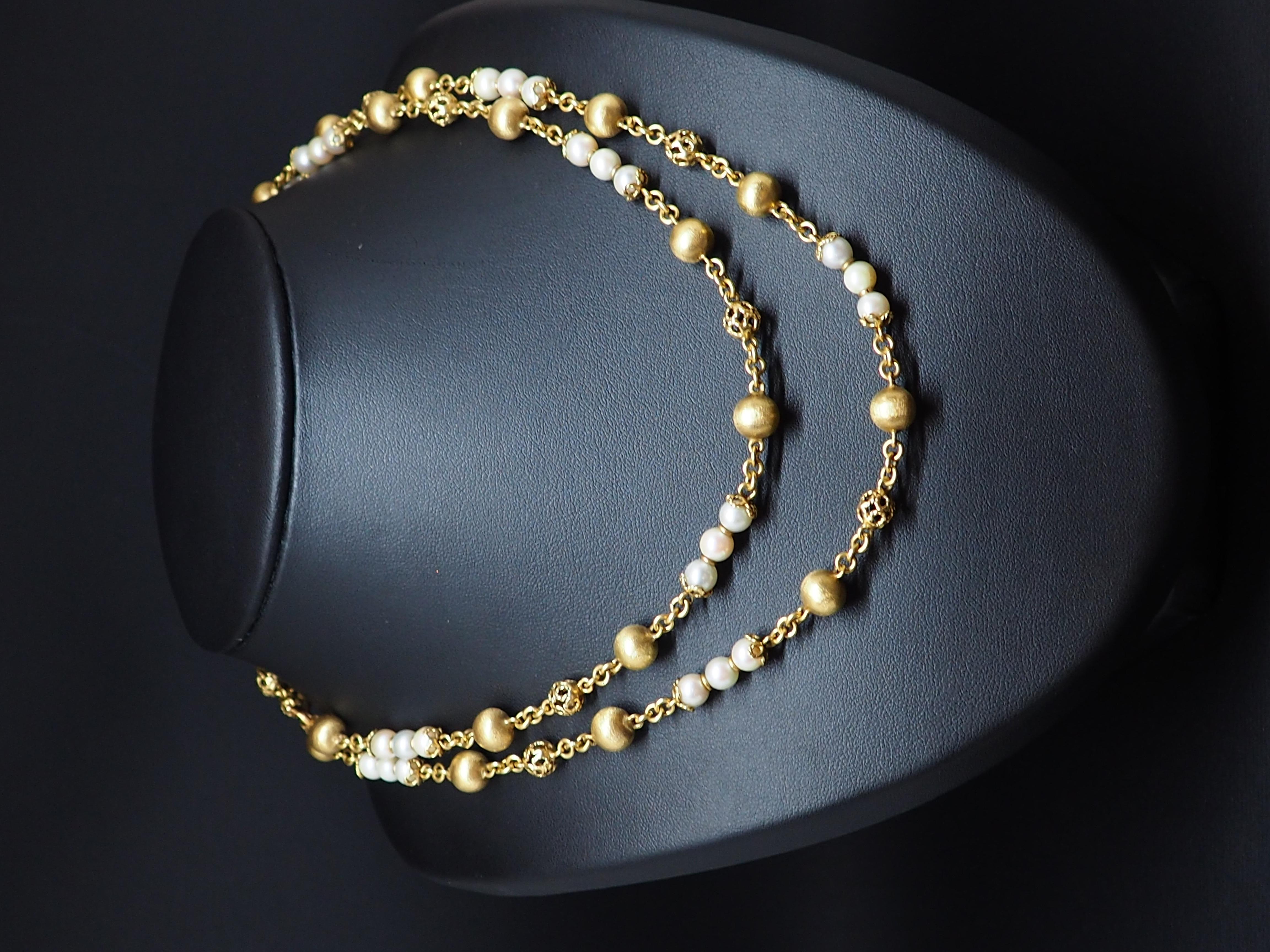 Experience Unparalleled Elegance with this Exquisite 18K Yellow Gold Beaded Necklace
This one-of-a-kind beaded necklace, masterfully crafted in sumptuous 18K yellow gold, represents the epitome of luxury and elegance. The necklace is generously