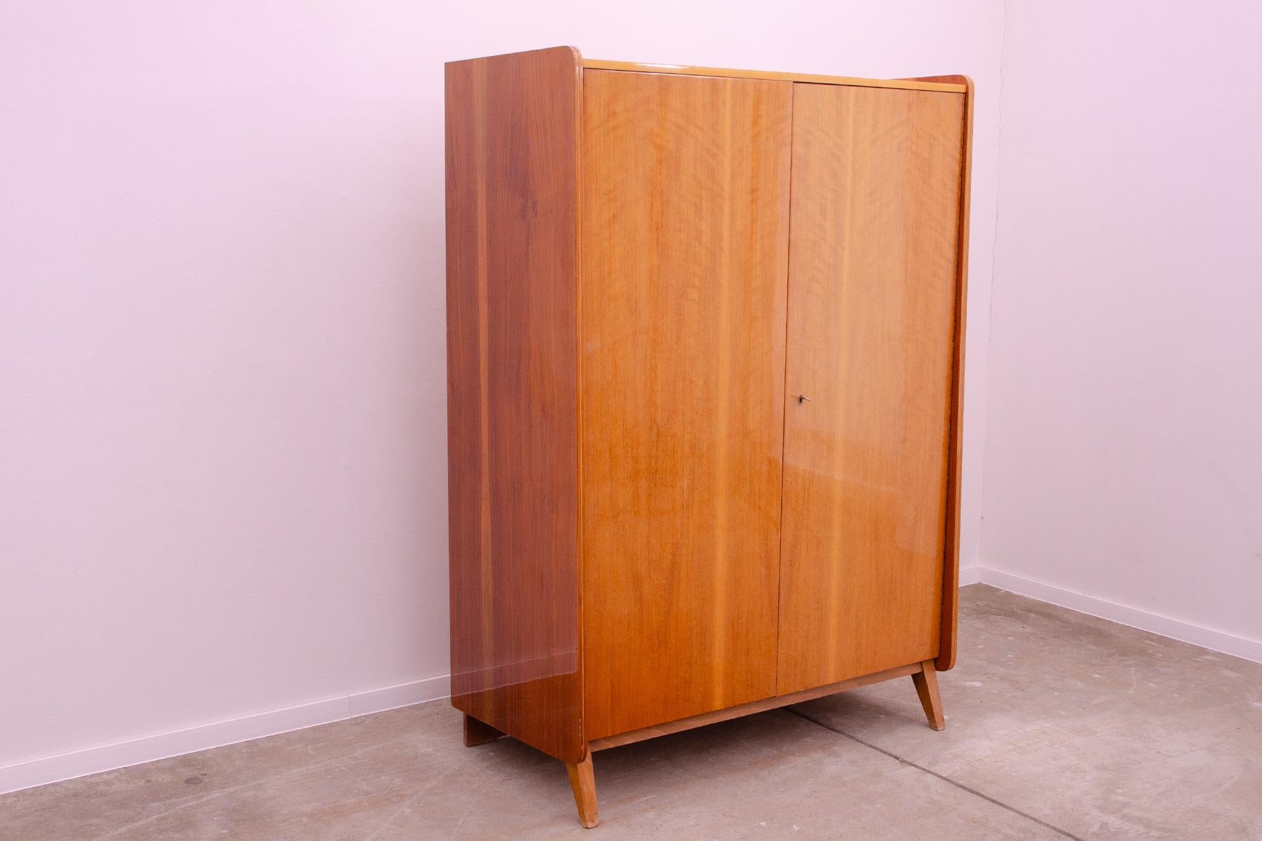 This wardrobe was designed by František Jirák for Tatra nábytok company in the former Czechoslovakia in the 1960´s

It´s made of high gloss polished beechwood and plywood.

You can hang your clothes in it, as well as use a set of drawers to place