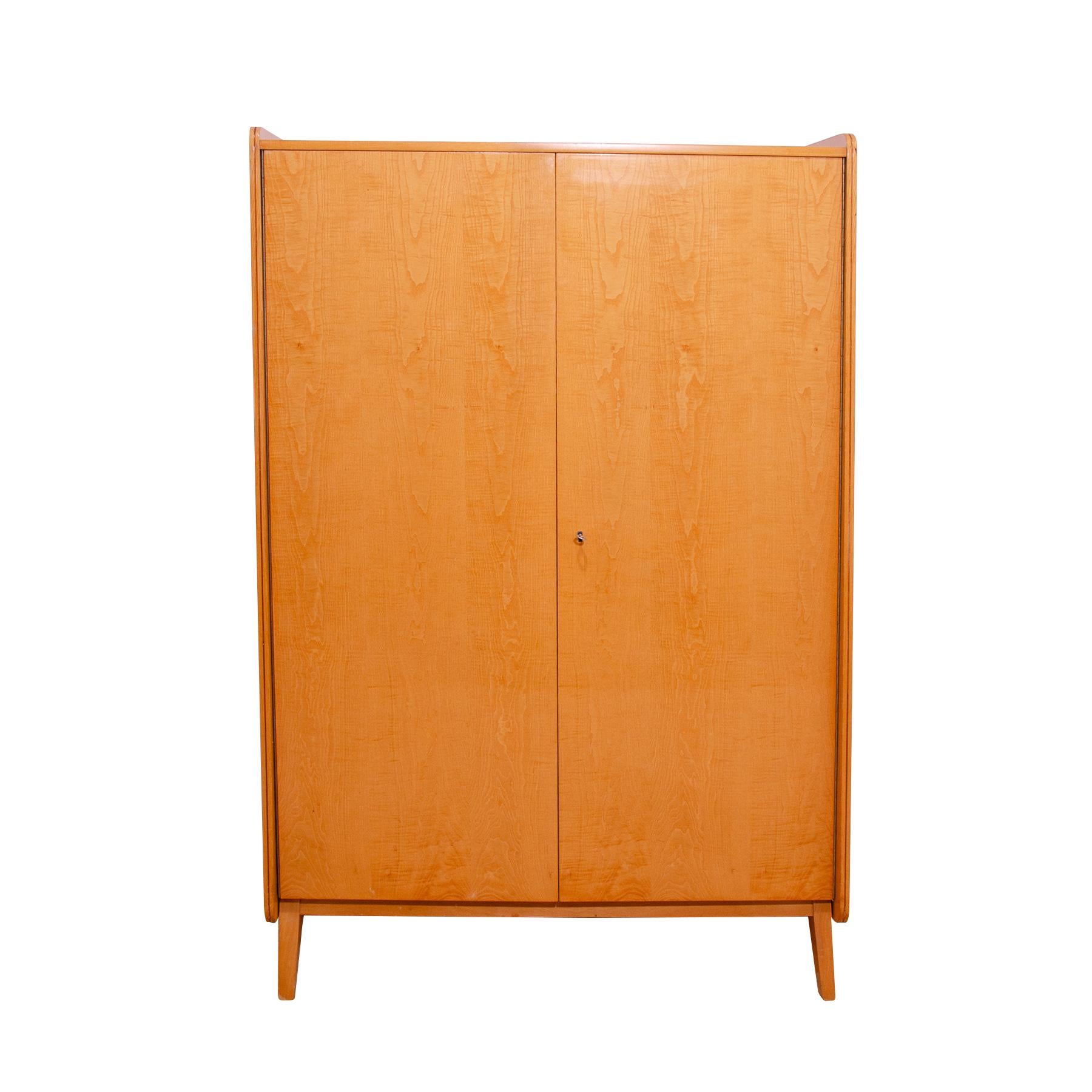 This wardrobe was designed by František Jirák for Tatra nábytok company in the former Czechoslovakia in the 1960´s

It´s made of beechwood and plywood.

You can hang your clothes in it,  place underwear, etc.

In very good Vintage condition, showing