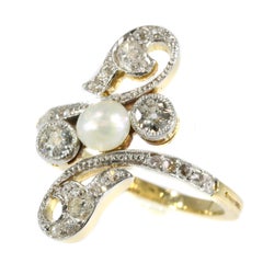 Elegant Belle Époque Diamond and Pearl Engagement Ring