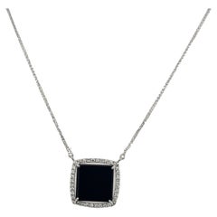 Elegant Black Onyx & Diamond Pendant In 18ct White Gold