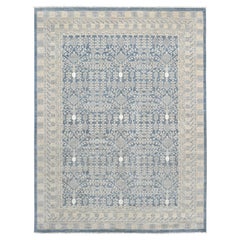 Handgeknüpfter Khoton-Teppich aus Wolle in Blau und Elfenbein 9'1''x12'