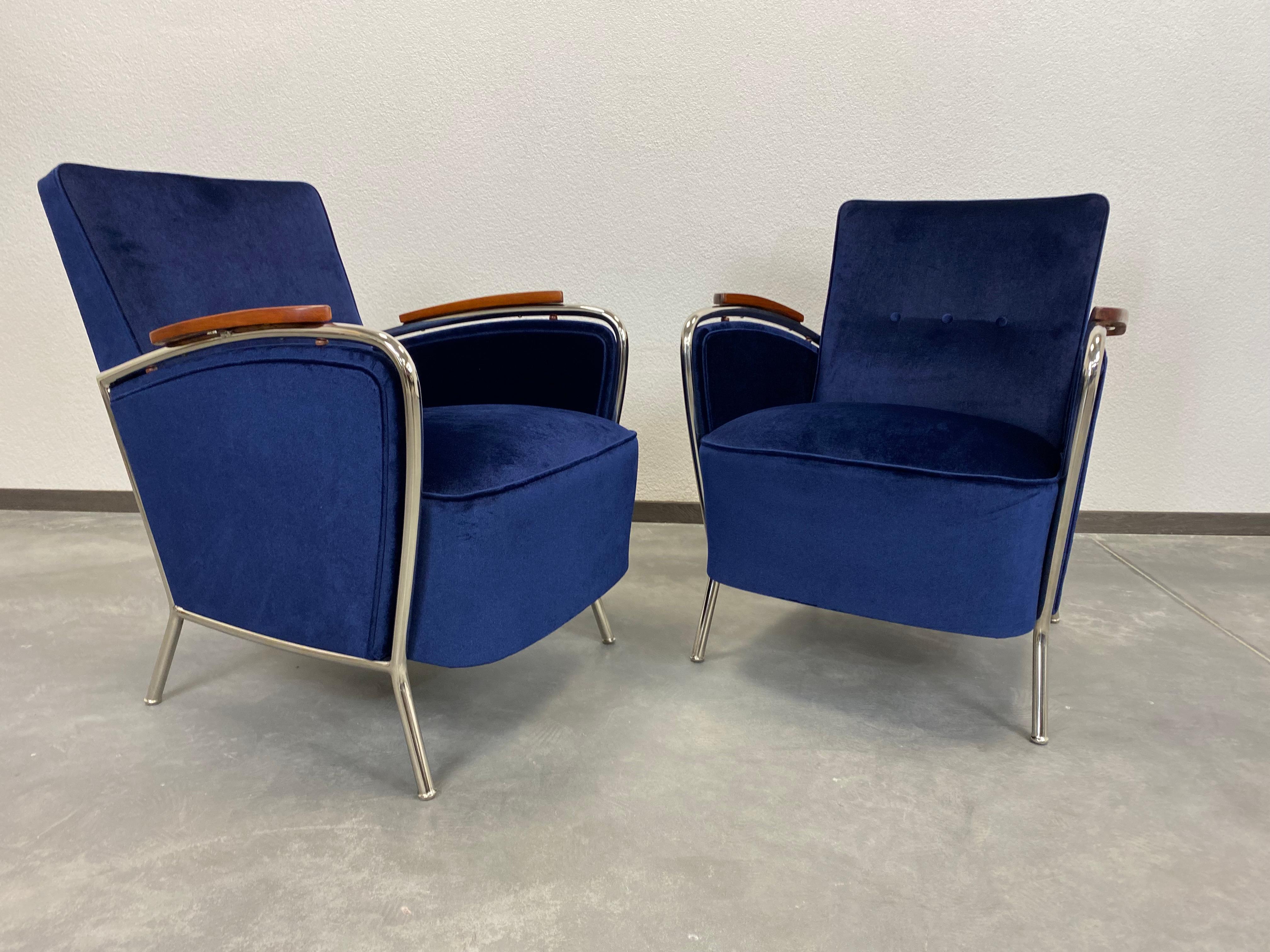 Elegant blue chrome armchairs Jozsef Peresztegi after complete refurbishment new chrome plating, dark blue fabric.