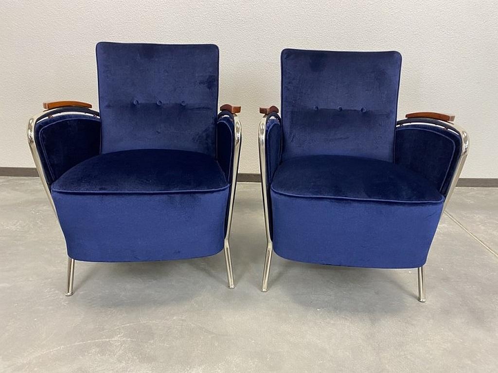 Elegant blue chrome armchairs Jozsef Peresztegi after complete refurbishment new chrome plating, dark blue fabric.
