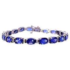 Elegante pulsera de piedras preciosas azules