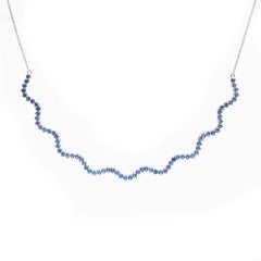 Elegant Blue Sapphire 18K White Gold Wave Necklace