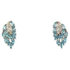 Elegant Blue Topaz Gemstone Flower Studs Earring for Women Set in Silver