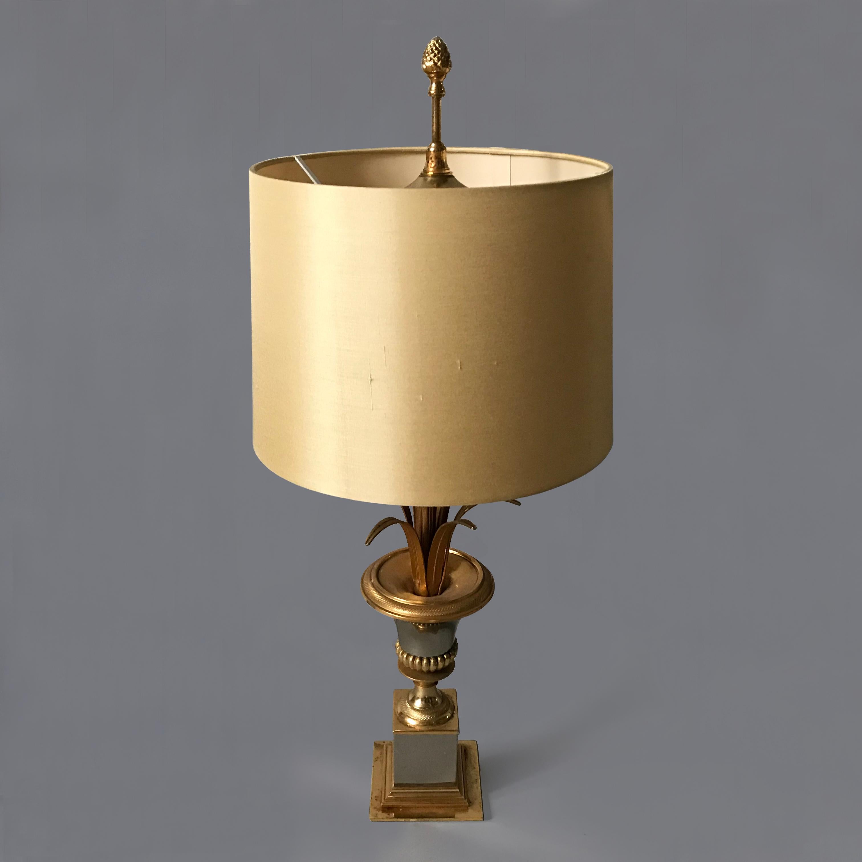 Elegant and beautifully proportioned midcentury Boulanger table lamp, in the manner of Maison Charles, in silver and gold metal. Re-wired & PAT-certified with optional silk shade.
