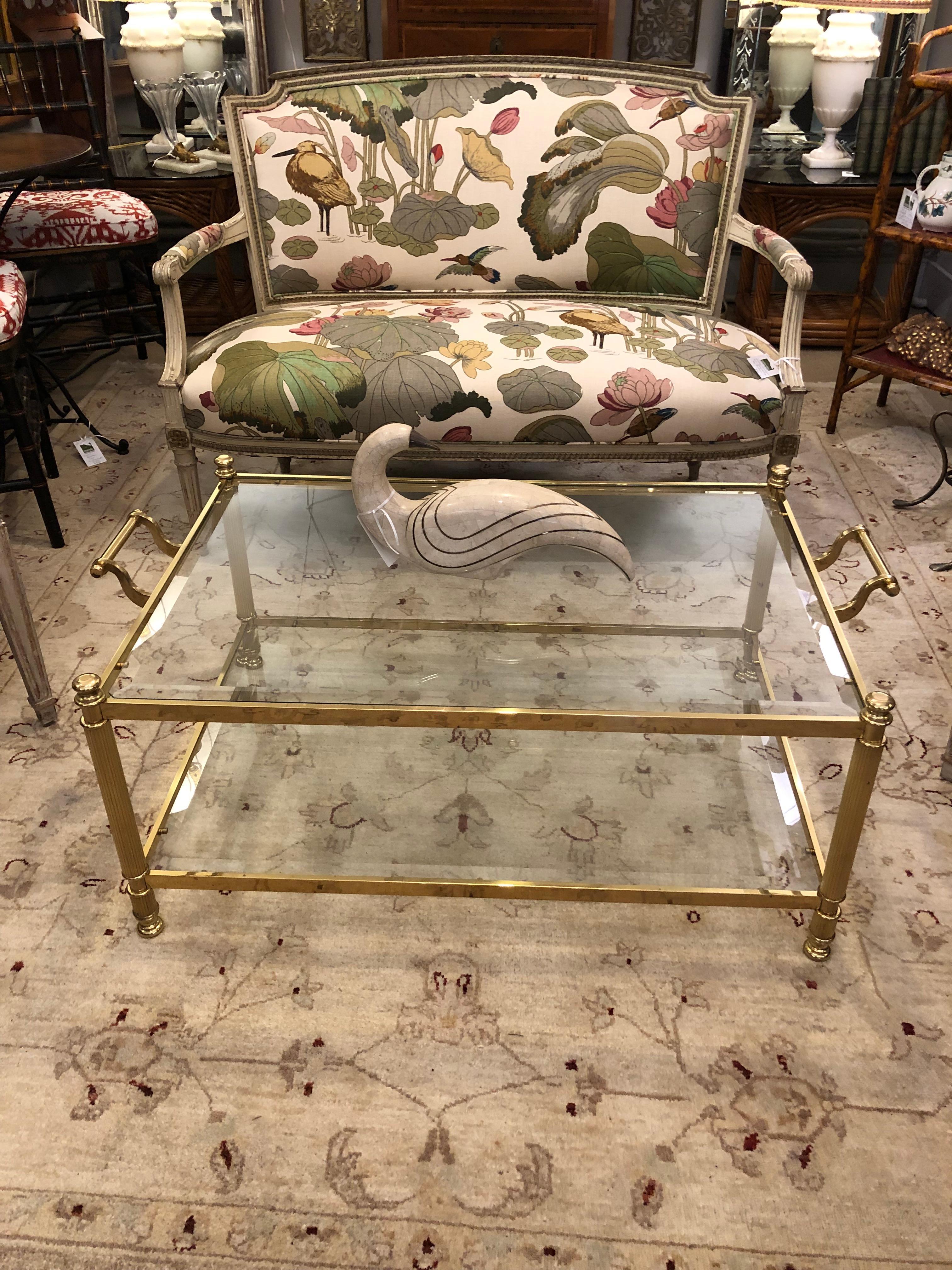 Elegant LaBarge brass and bevelled glass two tier coffee table having side handles (add 3.5