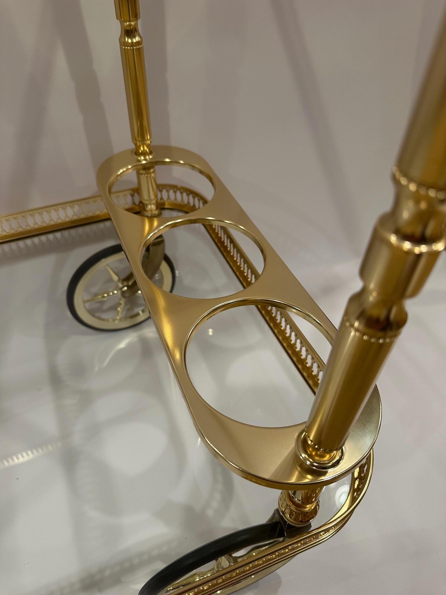 Elegant Brass Finish and Glass Two Tier Neoclassical Style Bar Cart In Good Condition In Hopewell, NJ