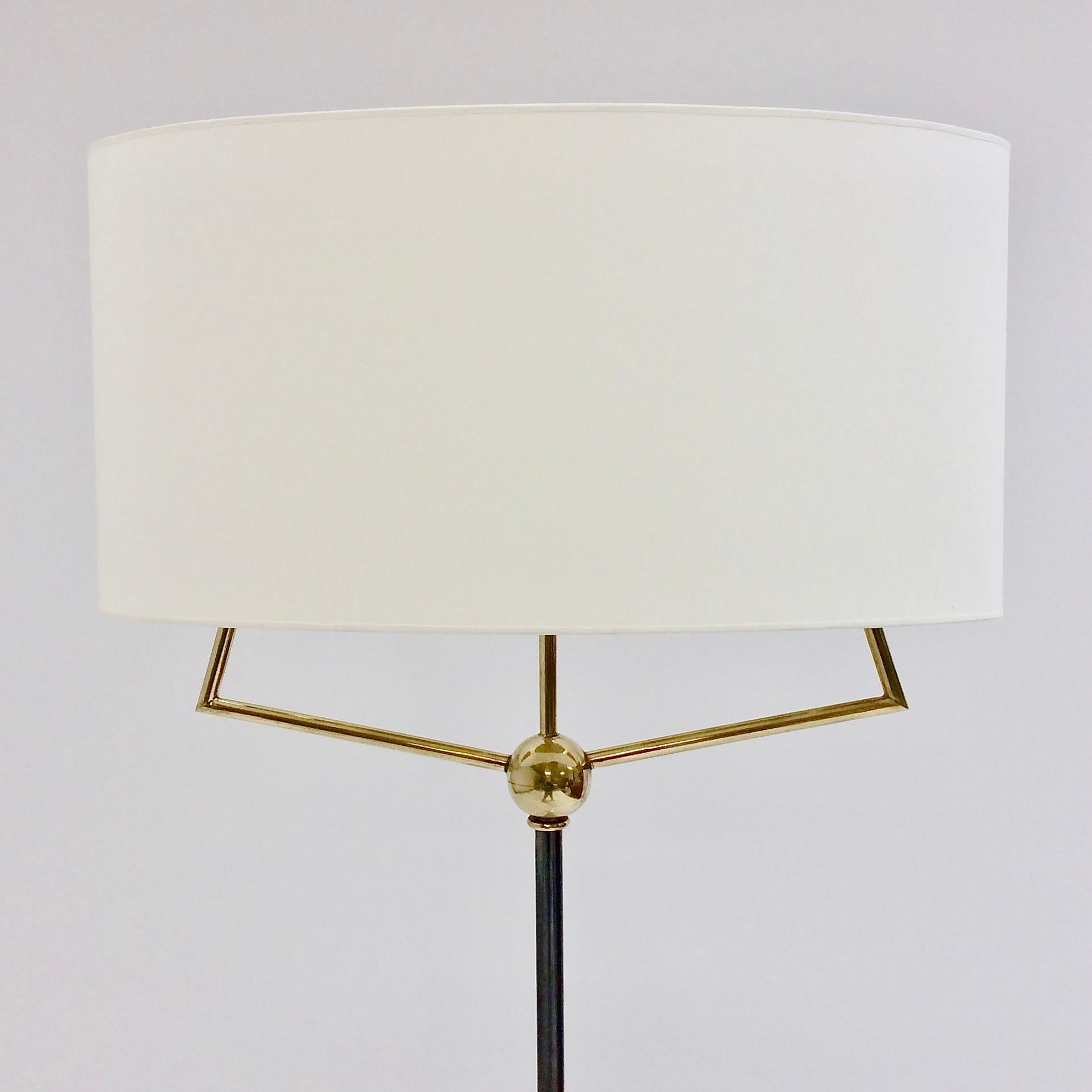 Elegant floor lamp, Leleu era, circa 1950, France.
Brass and patinated metal.
New ivory fabric redone as originally.
3 B22 bulbs of 40 W.
Dimensions: 163 cm H, 50 cm W, 26 cm D.
All purchases are covered by our Buyer Protection Guarantee.
This item