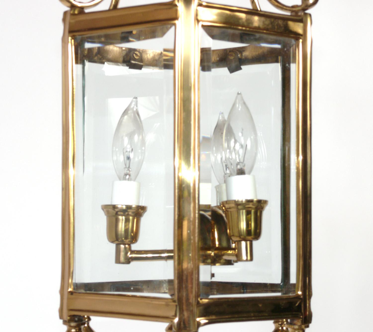 Elegant brass Lantern, American, circa 1960s. Elegant flush mount light fixture, perfect for a foyer or hall. Rewired and ready to mount.