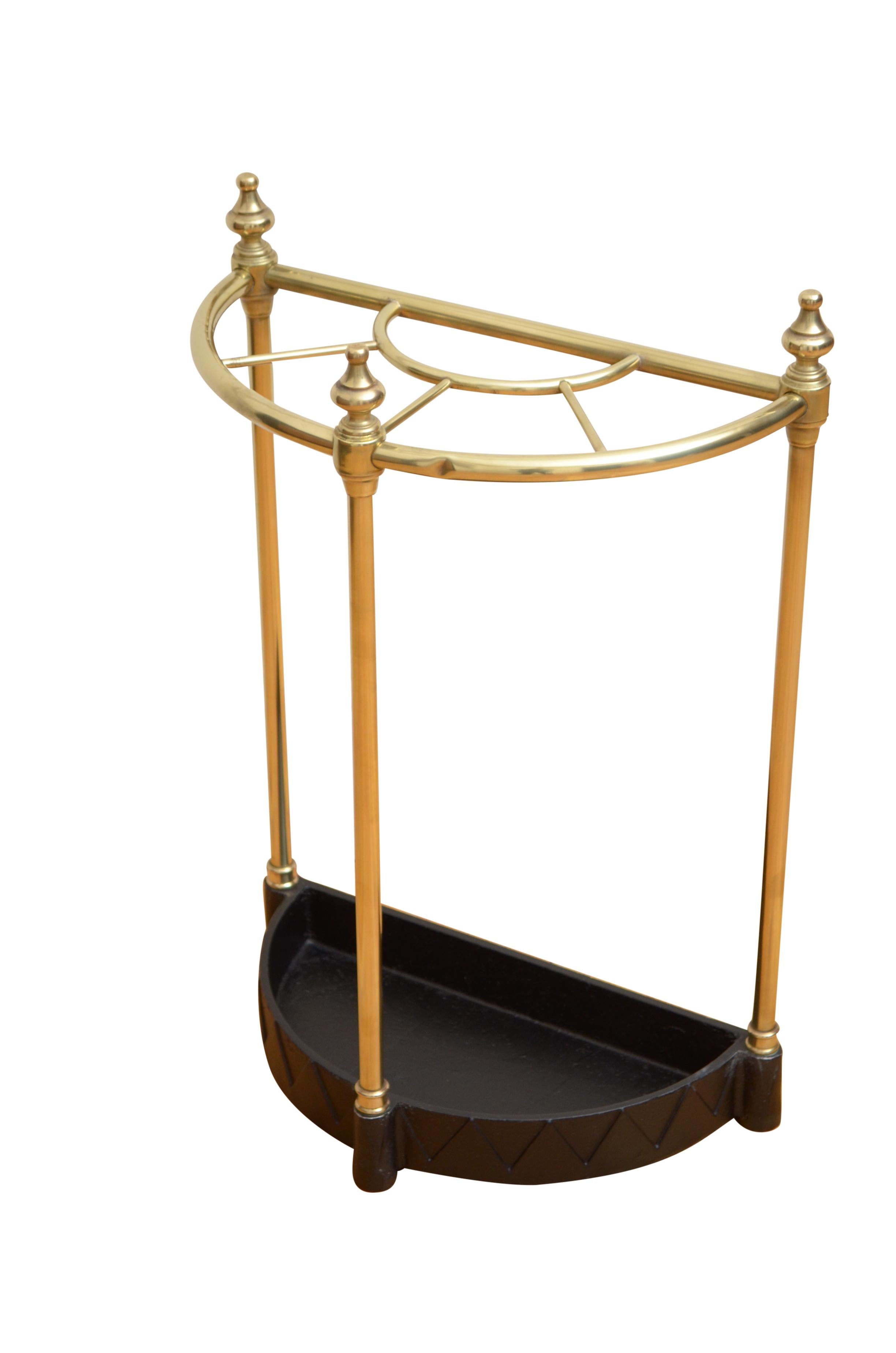 P0174 English demi lune, brass stick stand with four sections, decorative finials and shaped drip tray with stylish dog tooth decoration. This umbrella stand has been cleaned and polished and is in home ready condition.
Please view our full