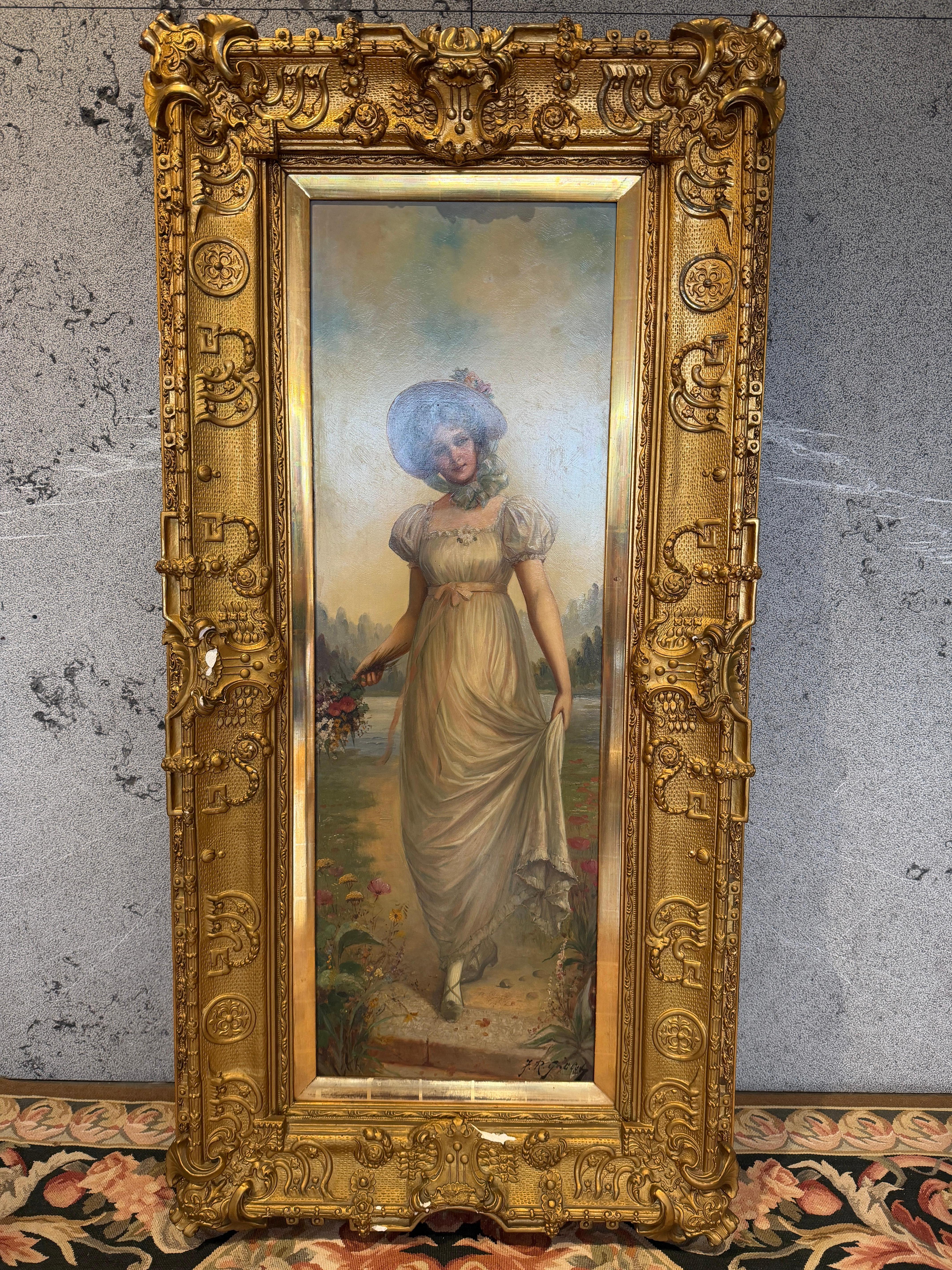 This enchanting circa 1880 painting portrays a graceful young woman strolling through a lush garden landscape, her light Empire-style gown flowing gently as she carries a small bouquet of wildflowers. The artist’s signature appears in the lower