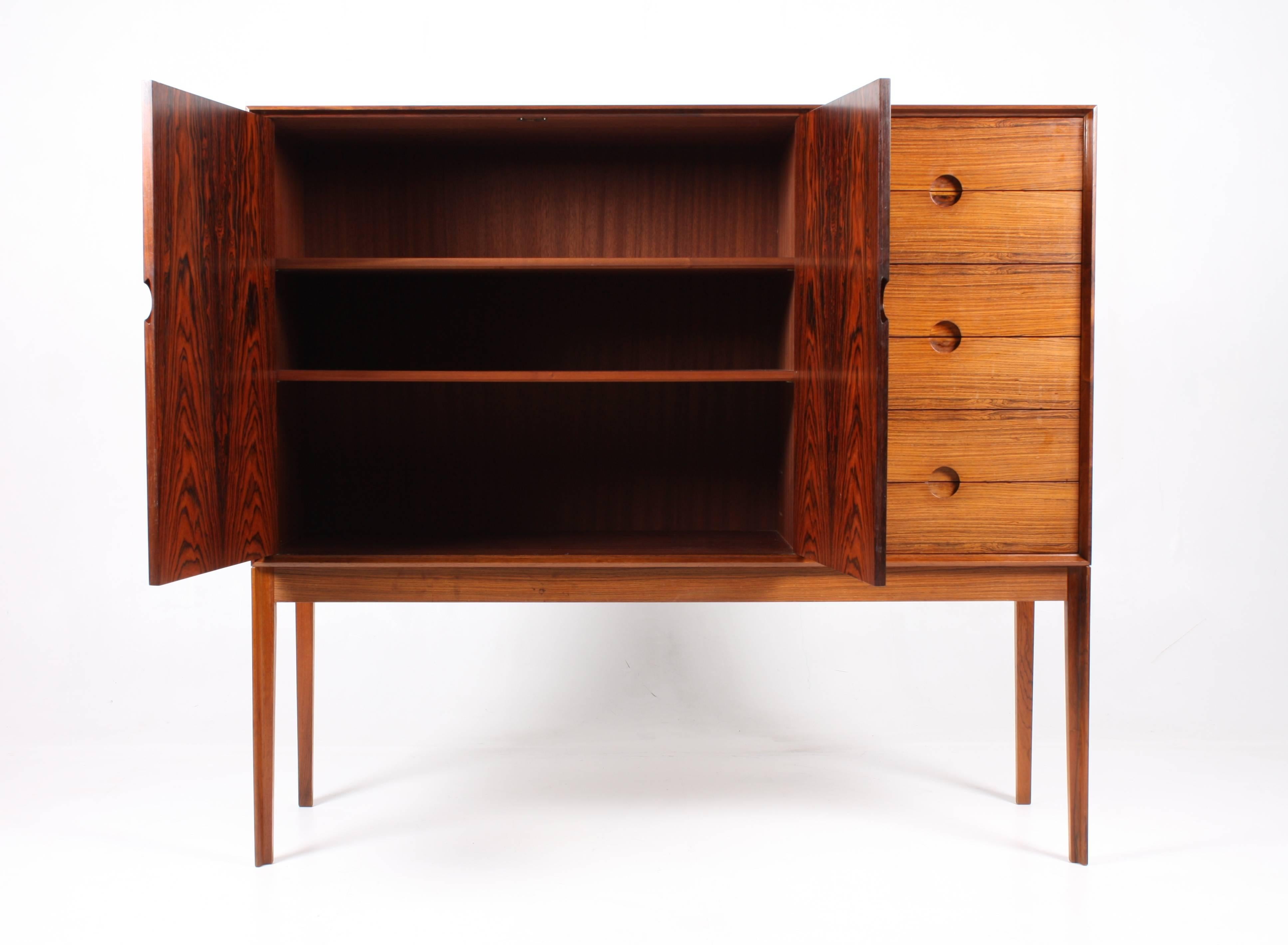 Elegant cabinet in rosewood designed by Kai Kristiansen for Aksel Kjersgaard cabinetmakers in the late 1950s. Outstanding quality and design. Made in Denmark. Great original condition.