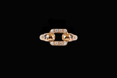 Elegante anello Cartier realizzato in oro giallo 18 carati con zaffiri e diamanti