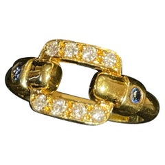 Elegant Cartier Ring Crafted in 18K Yellow Gold with Sapphires and Diamonds