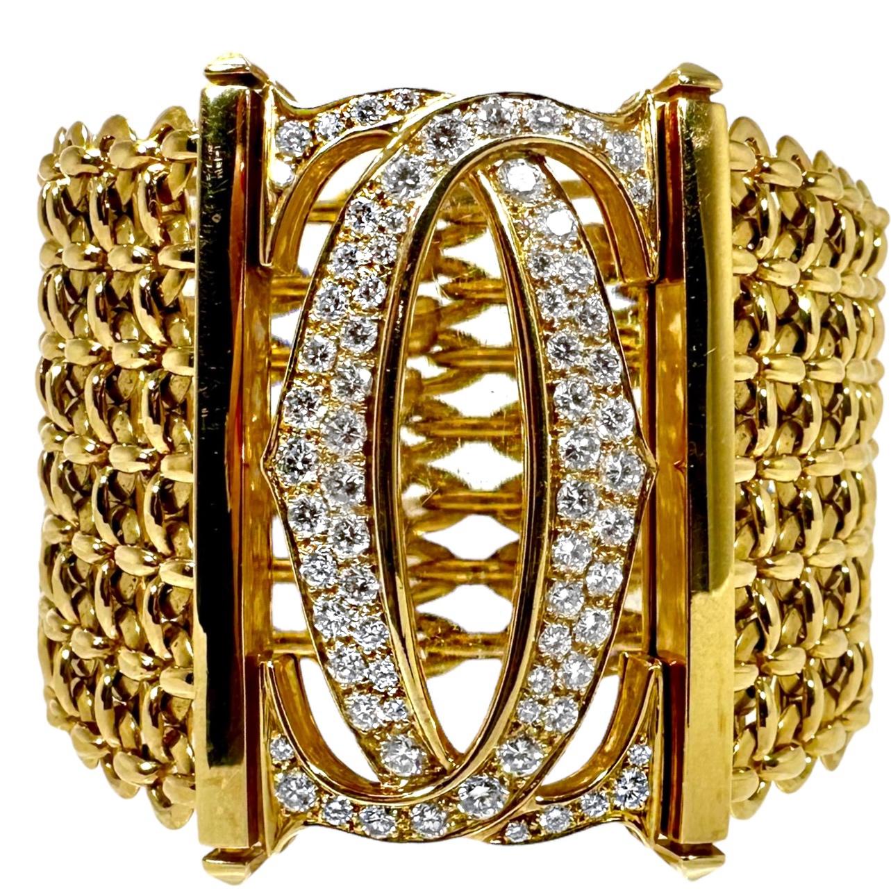 This very iconic European Cartier seven row Penelope bracelet with diamond crossed 