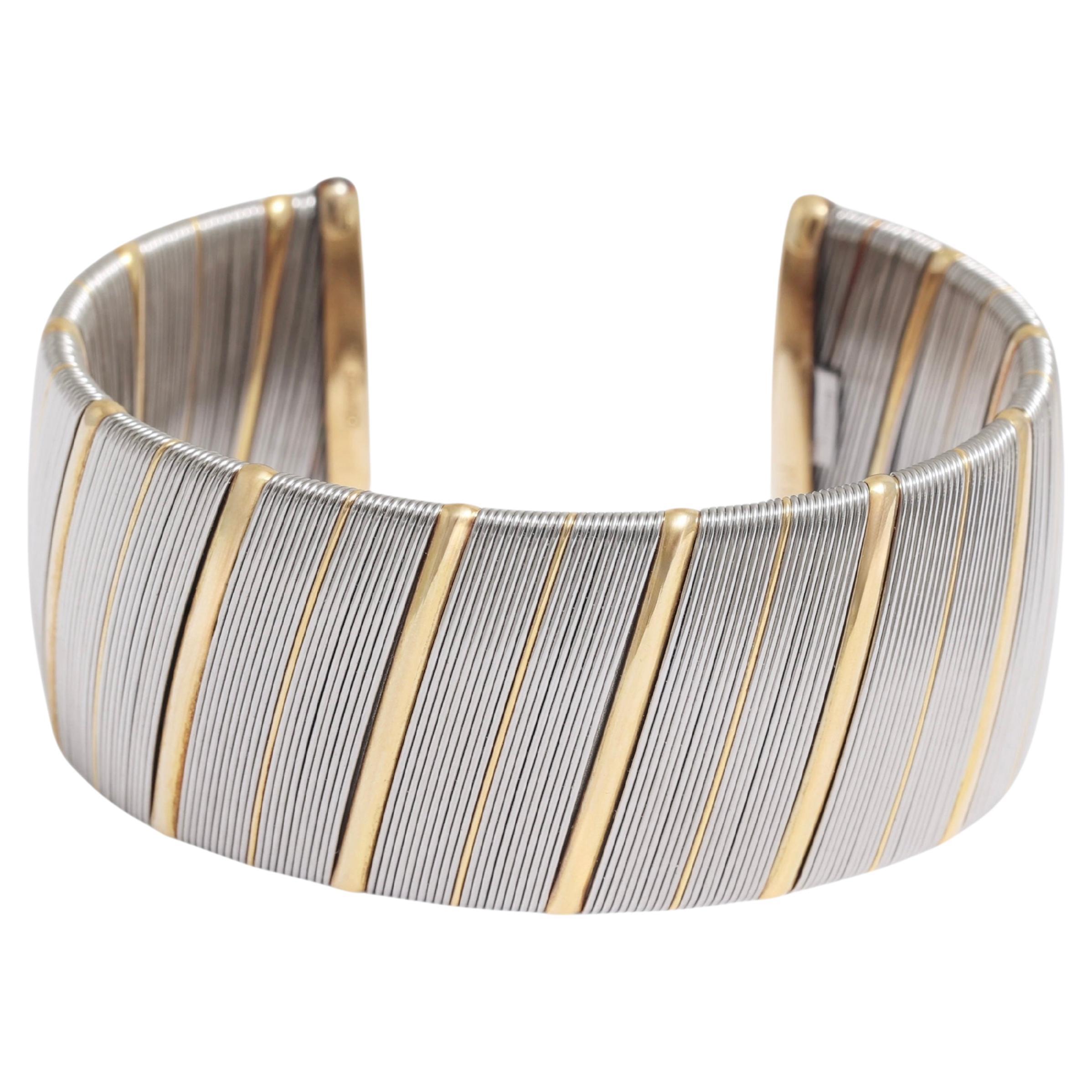 Elegant Cartier Two-Tone Gold & Steel Cuff Bracelet – Modern Classic Design