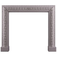Elegant Carved Bolection Fireplace in Limestone