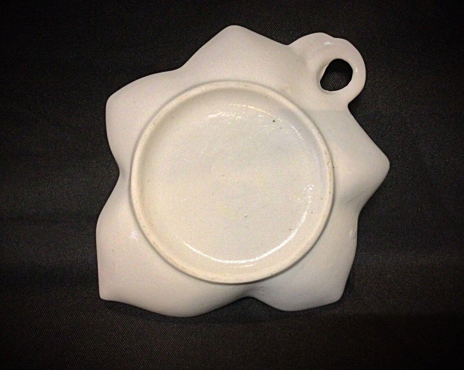 Enhance your space with this beautiful small trinket dish or paperweight, featuring a delicate ceramic rose. Its charming design adds a touch of elegance to any desk or vanity.

Product Details:

Type: Trinket Dish or Paperweight
Design: Ceramic