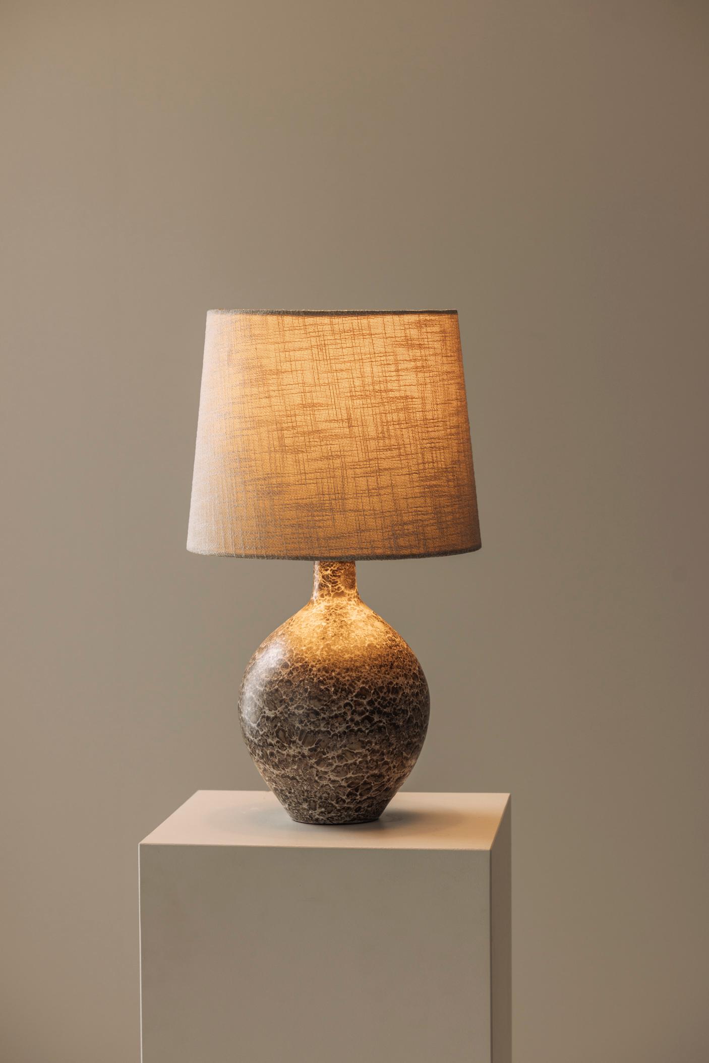 French Elegant ceramic table lamp sourced in France dating from the 1960s For Sale