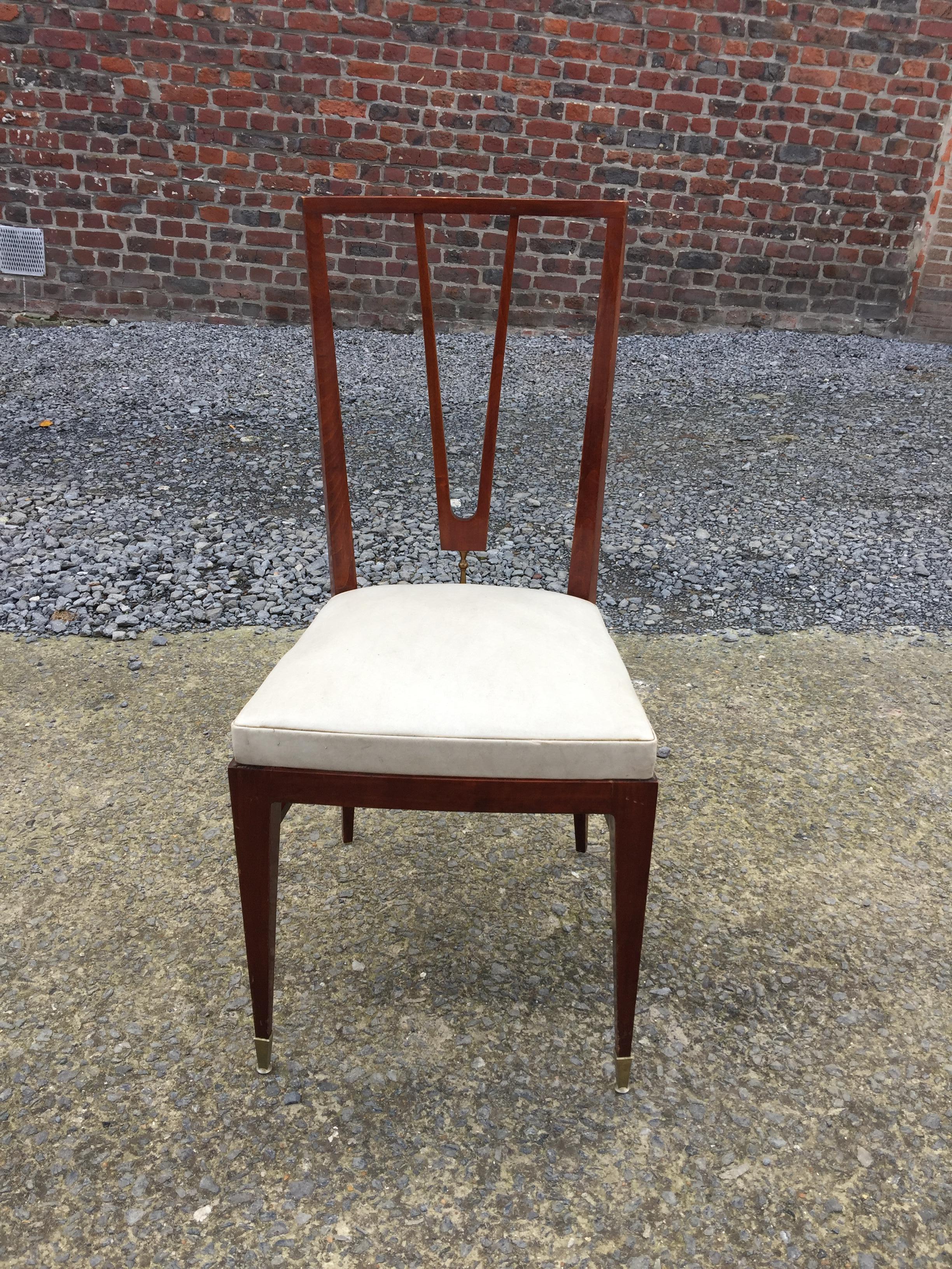 Elegant chair in stained beech and brass, France or Italy, circa 1940.