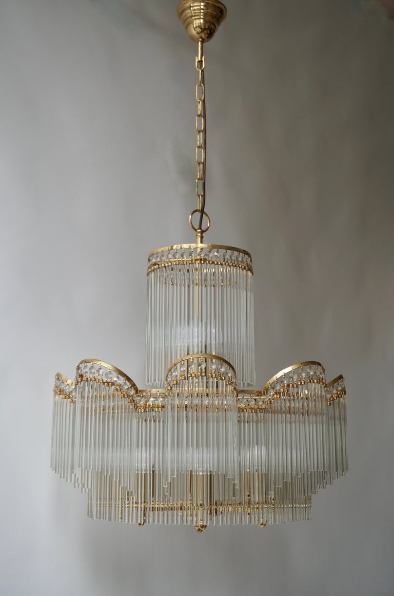 A spectacular and elegant chandelier made of Murano glass tubes, Italy 1970s. Art-Nouveau, Art-Deco, neoclassique, Shabby-Chic.

Measures: Diameter 24 inch - 62 cm.
Height fixture 28 inch - 70 cm.
Total height including the chain and ceiling